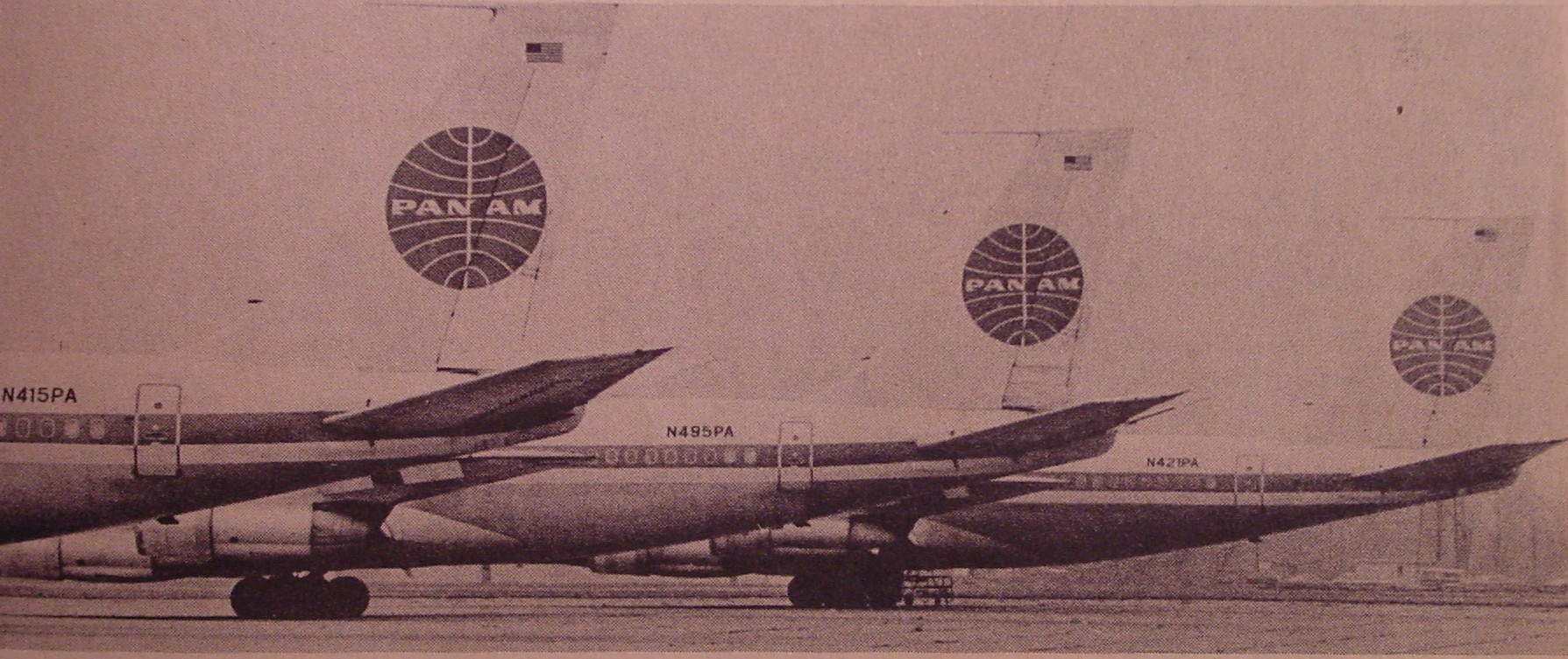 Three Pan Am 707 tails on the ramp in Detroit.